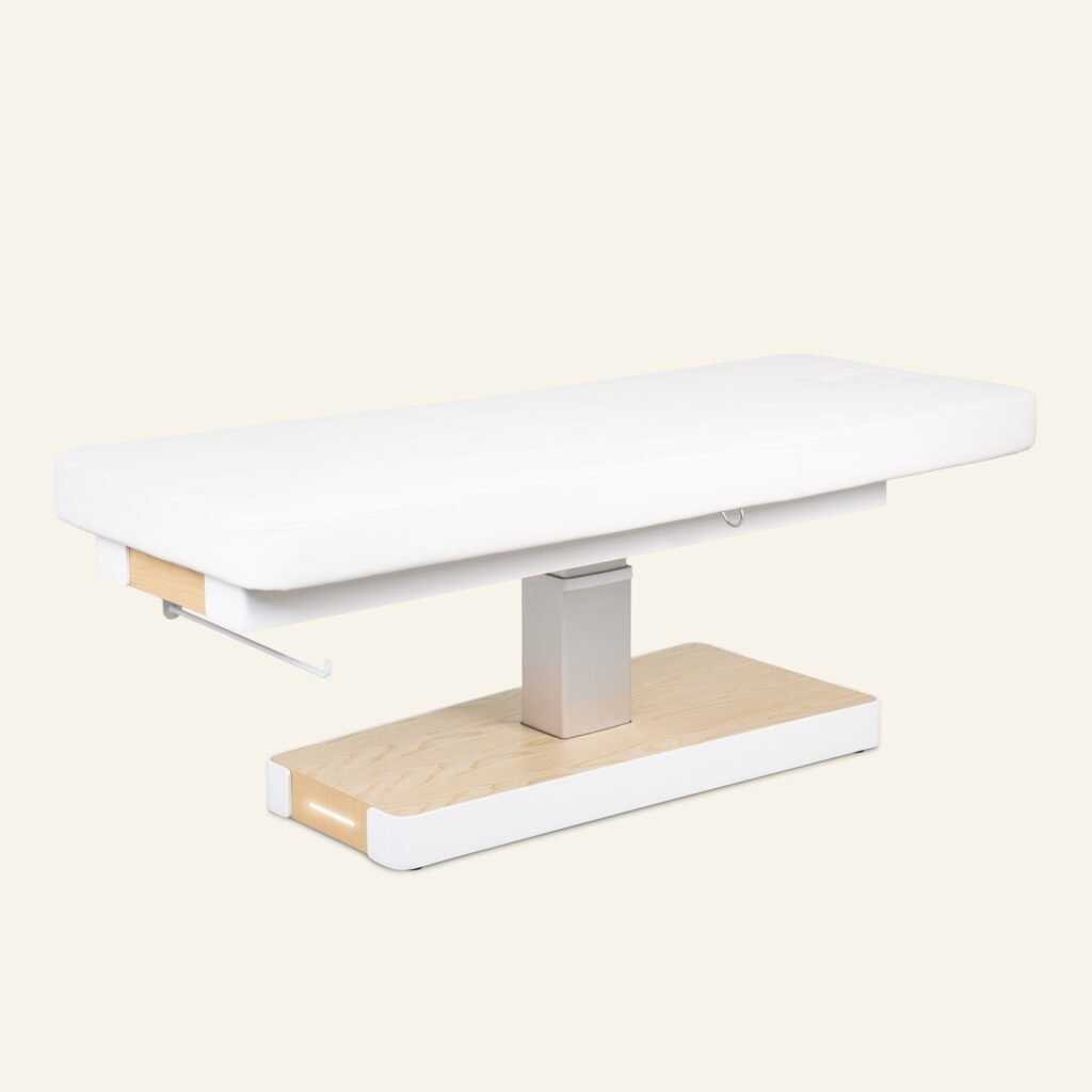 Table de soin blanche moderne avec piètement en bois