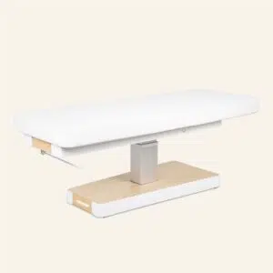 Moderne witte behandelbank met houten onderstel