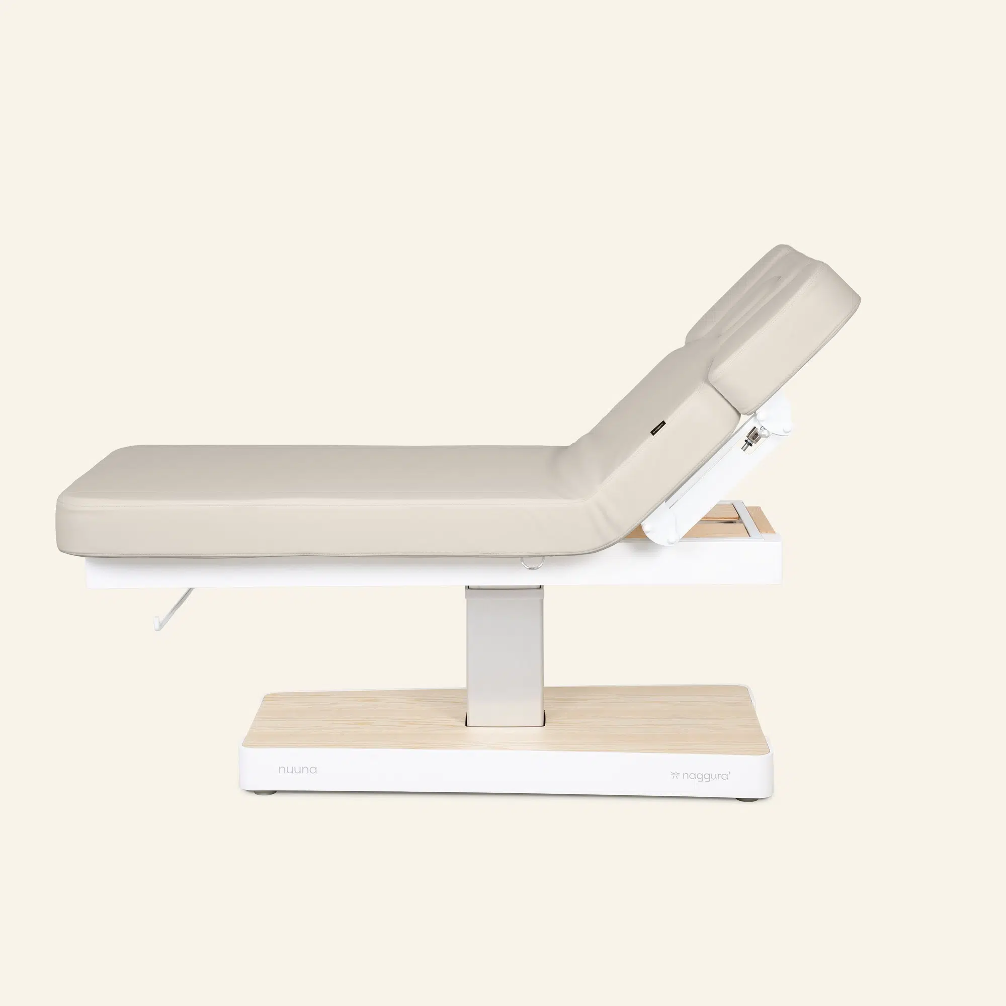 Verstelbare behandelstoel met beige bekleding