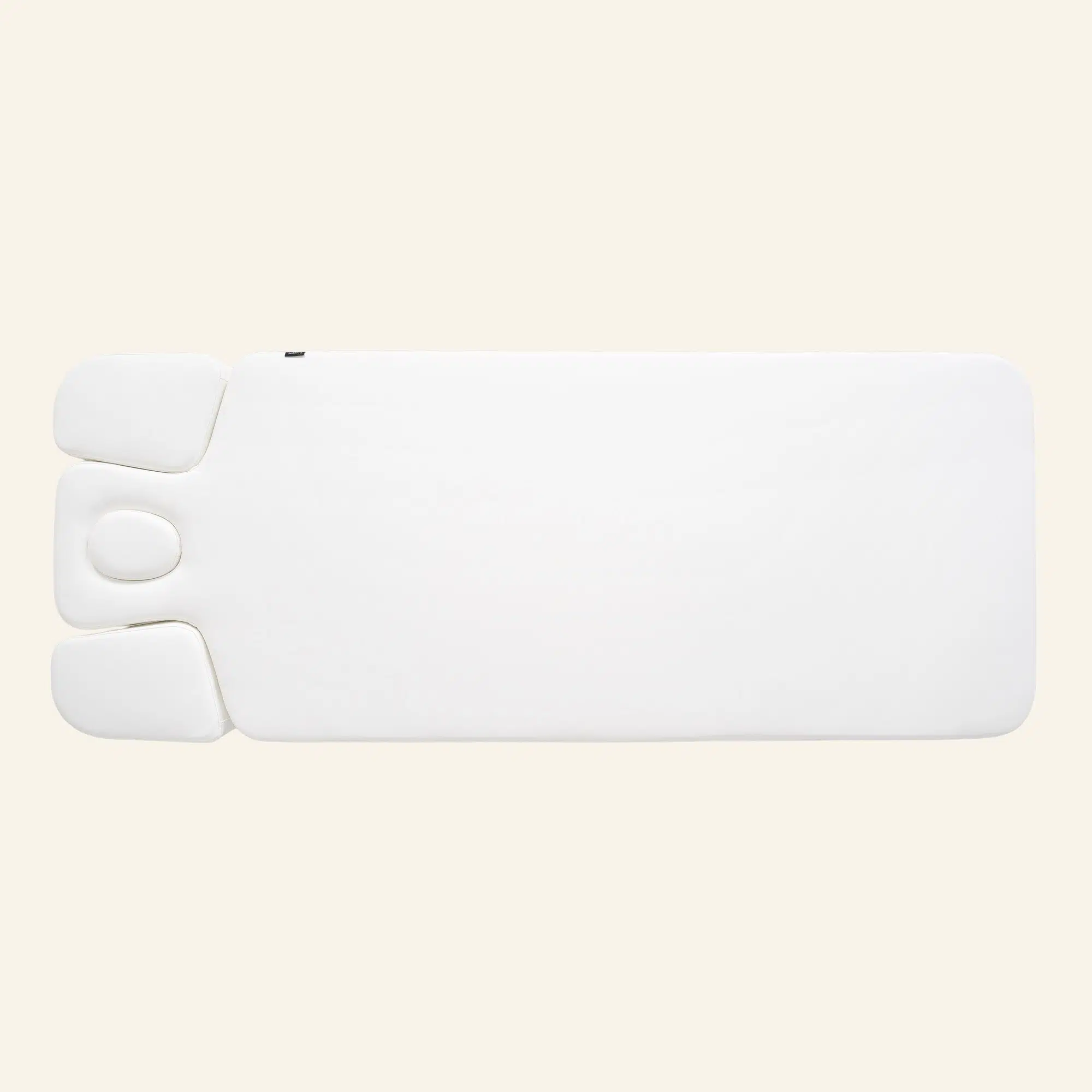 Witte massagetafel met hoofdsteun en gezichtsuitsparing